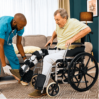 Caregivers conducting clinical check with tablet